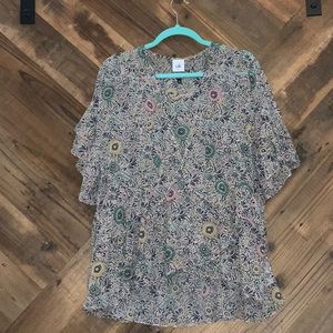 CAbi smock-style blouse.